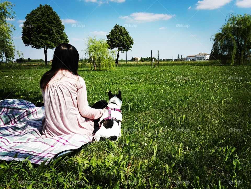 a young girl and a dog