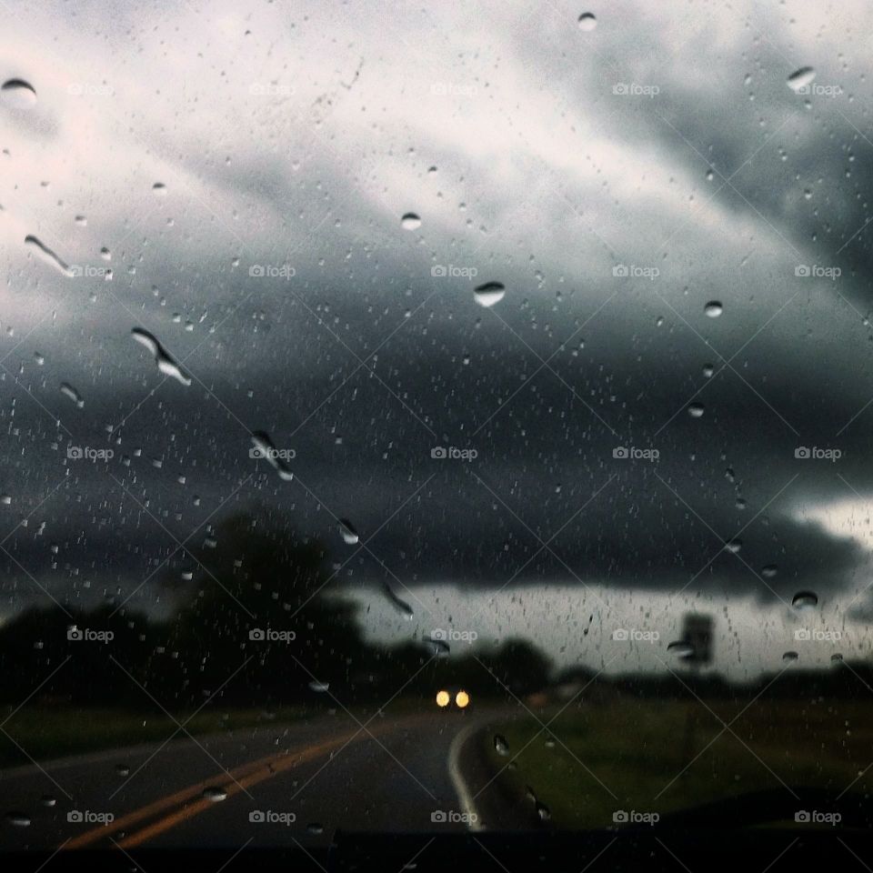 Storm Ahead Thru a Car Windshield