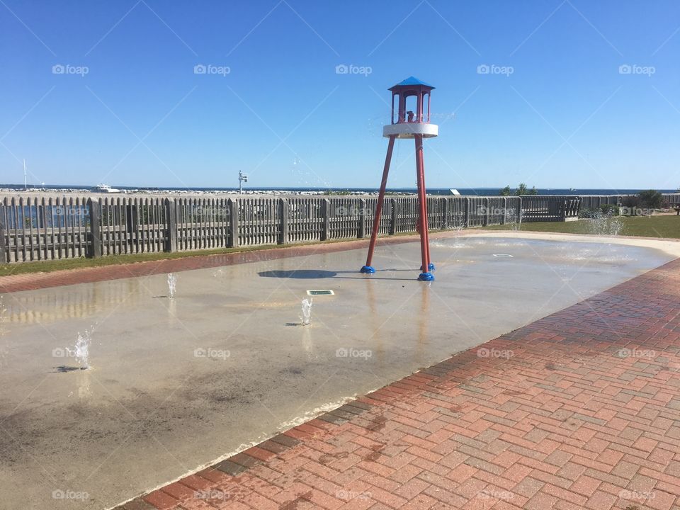 Water fountain off a pier 