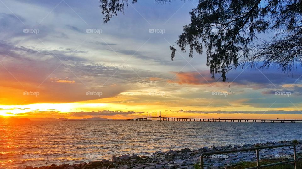 bridge, seascape and beautiful sunset