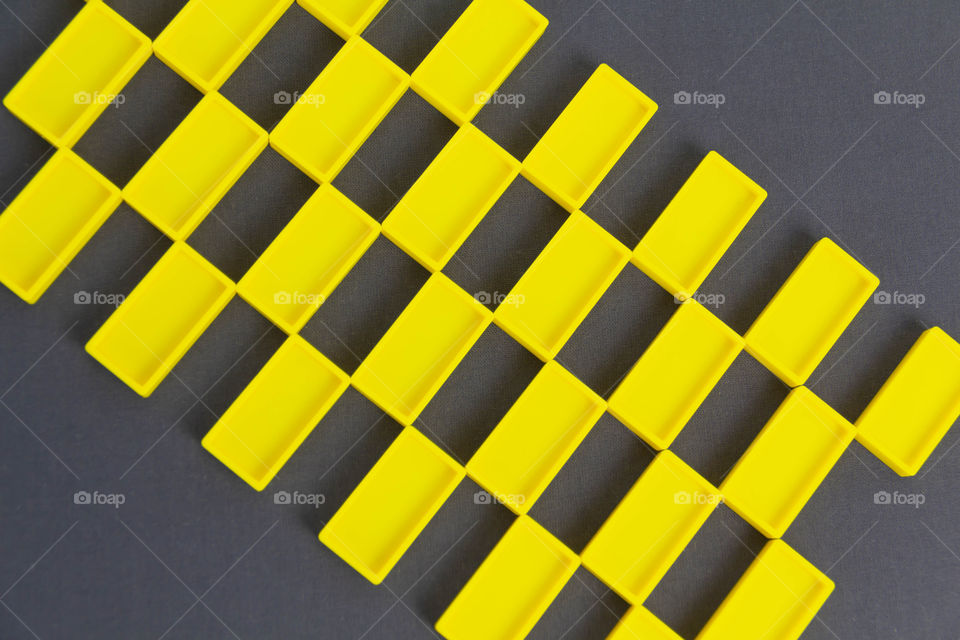 yellow rectangular objects on a gray background