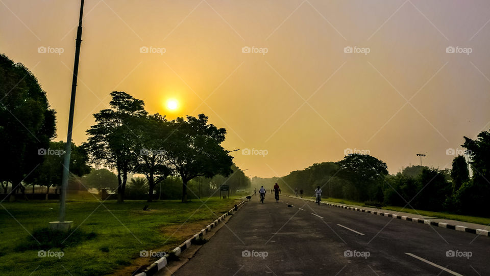 Morning walk with people cycling and exercising