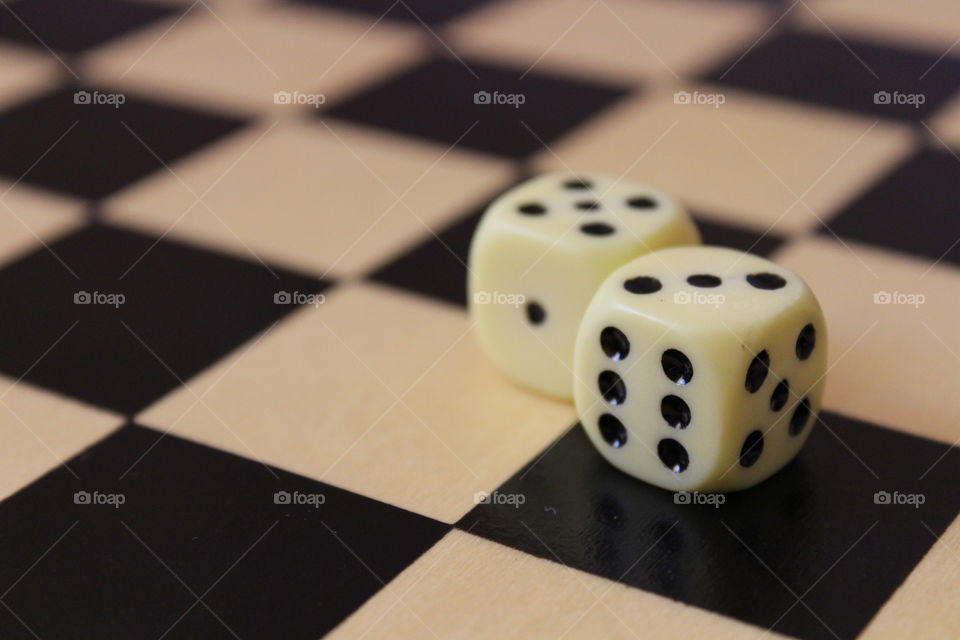 two dices on a chess board