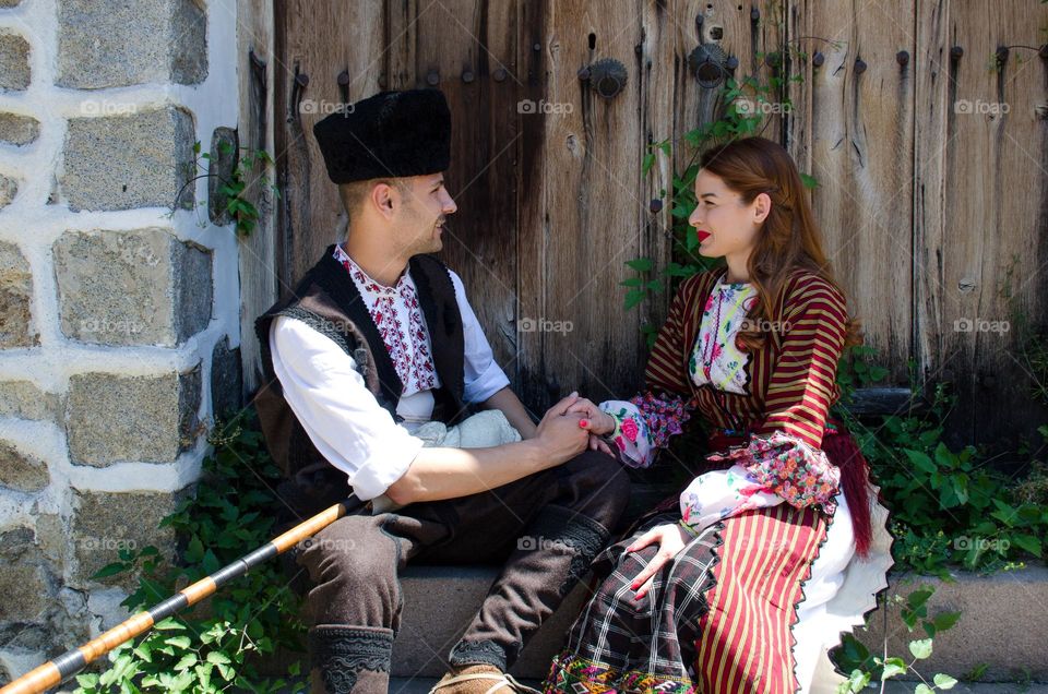 Tenderness Series:Beautiful Happy Couple Young Husband Wife, Dressed in Bulgarian Traditional Clothing (nosiya)