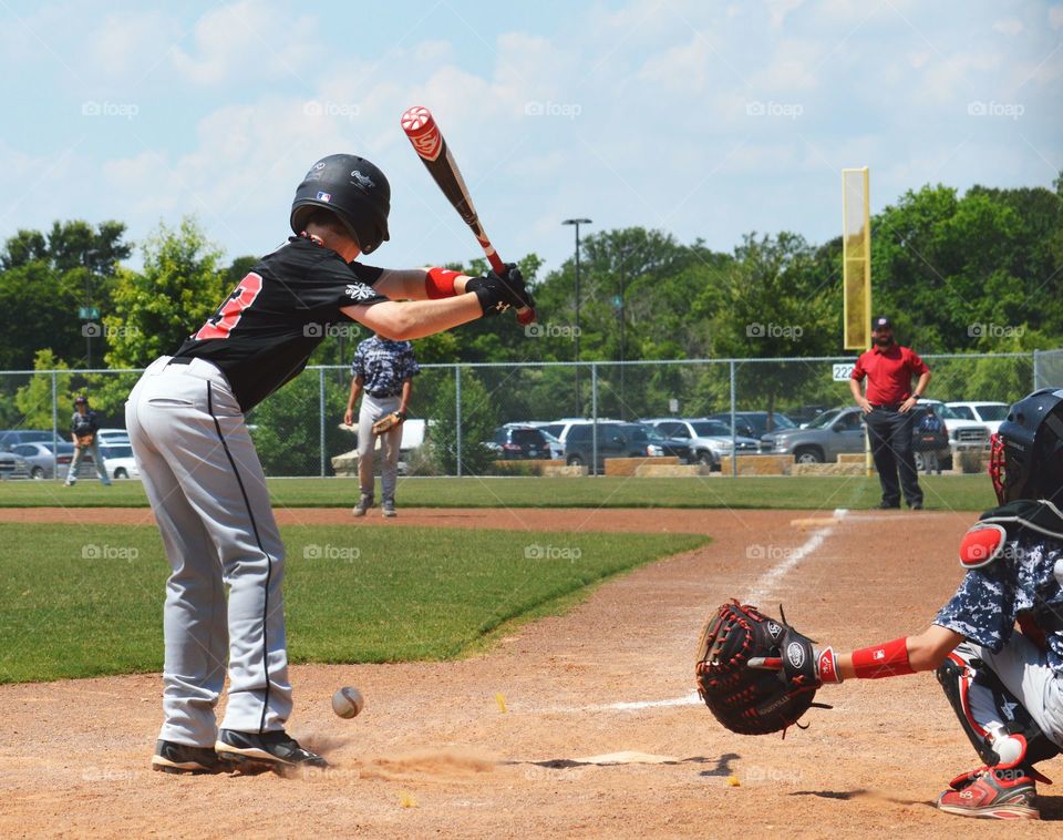 Bad pitch. Baseball player at bat. 