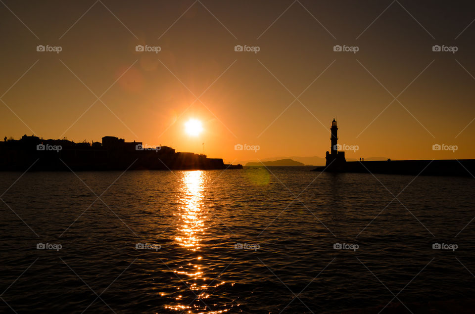 Chania Old Town Harbour. Lighthouse Silhouette