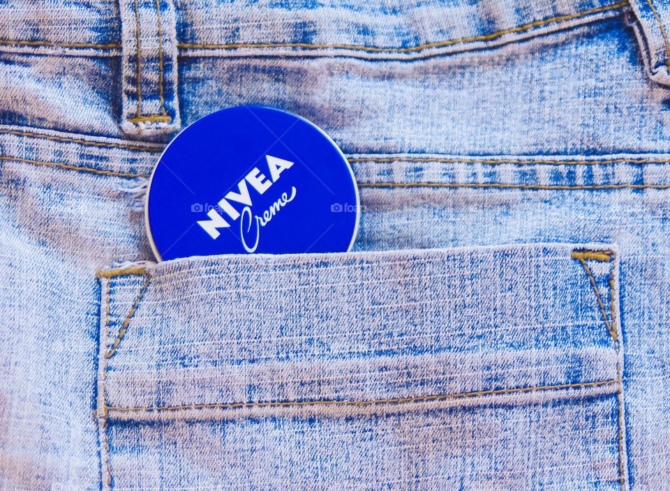 Nivea cream in jeans pocket