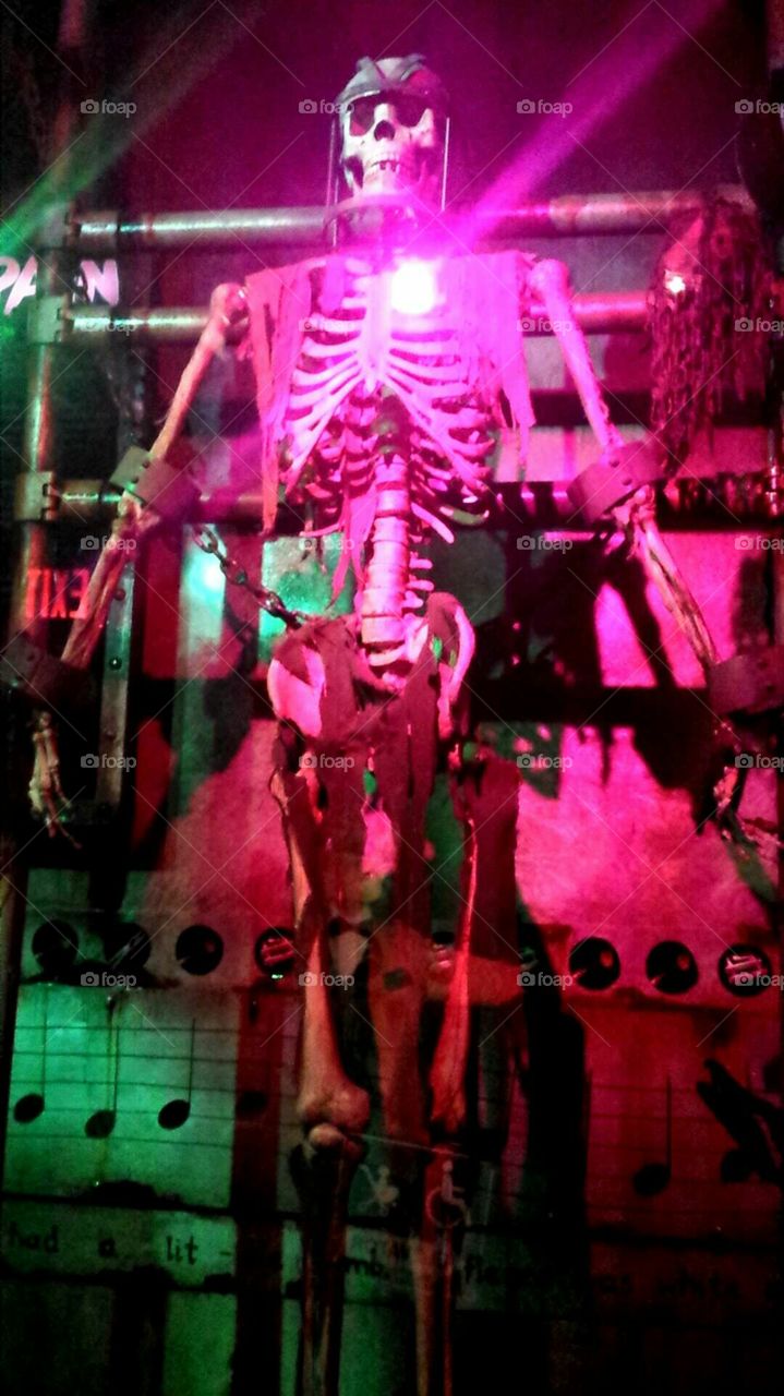 Skeleton chained up in a museum in San Antonio, Texas. He must have been there a while.