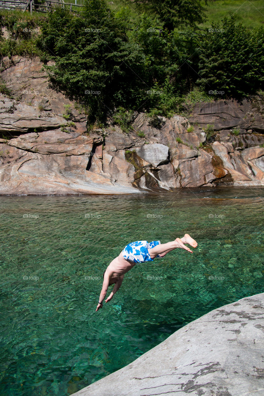 Person jumping in water