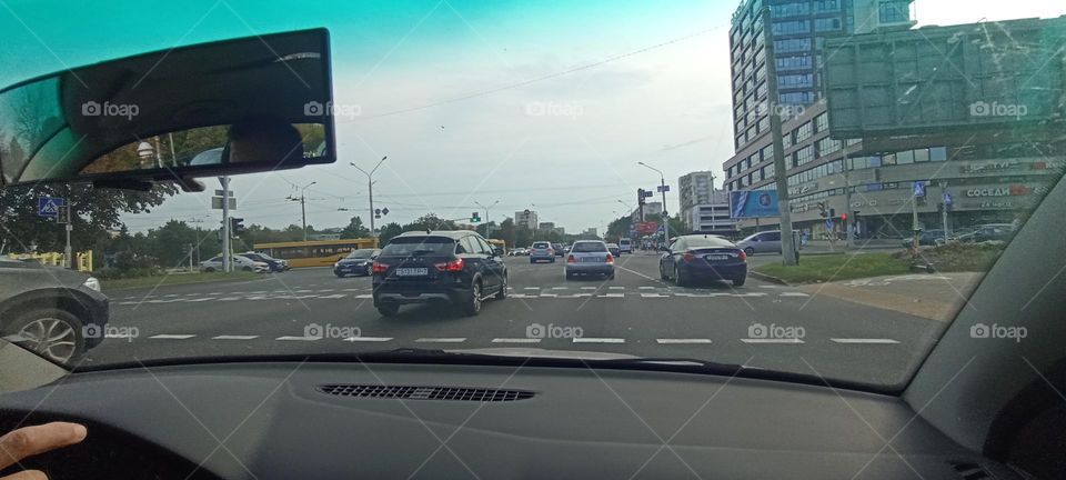 driver in car road window view summer time