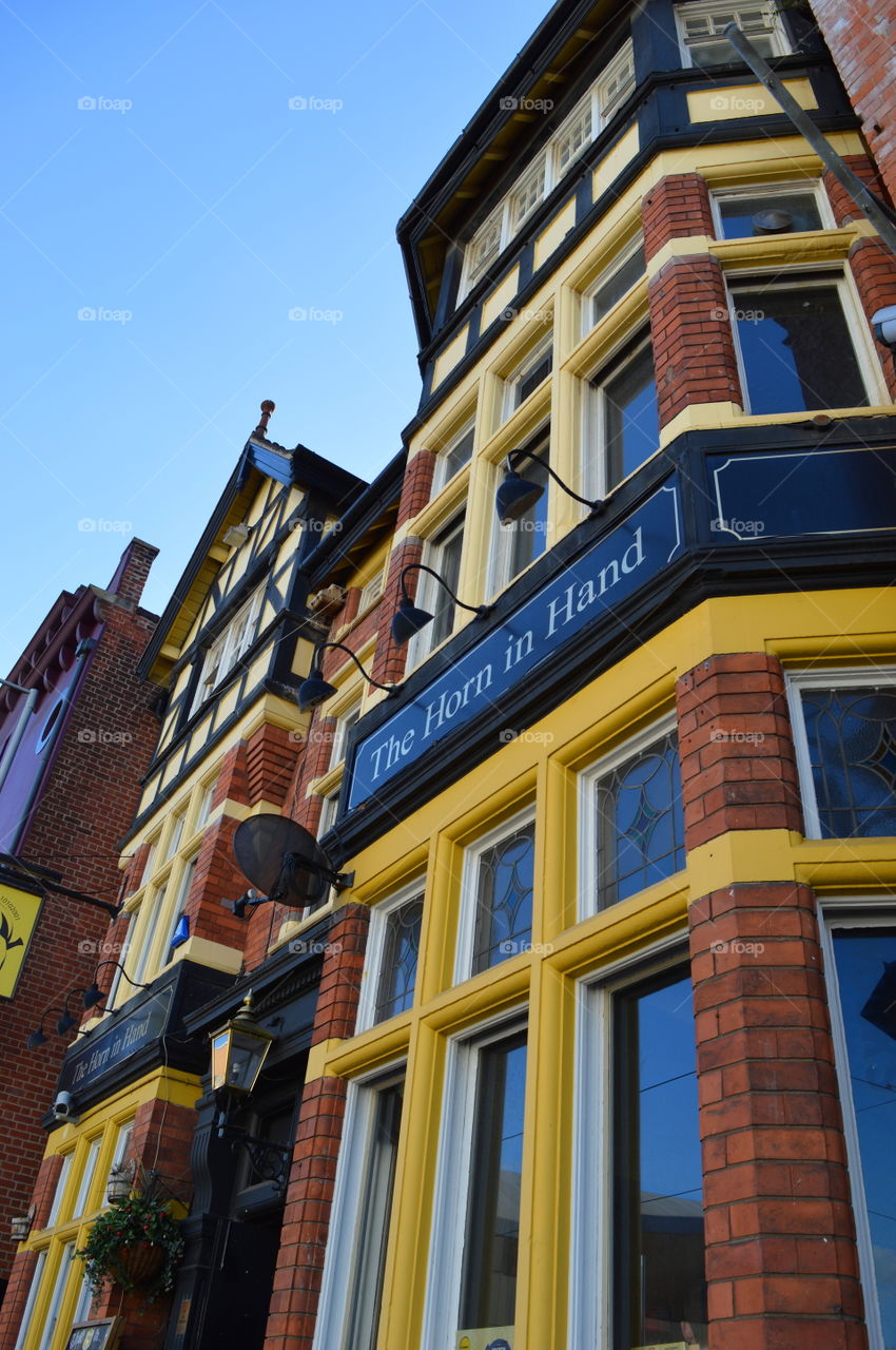 buildings with yellow elements