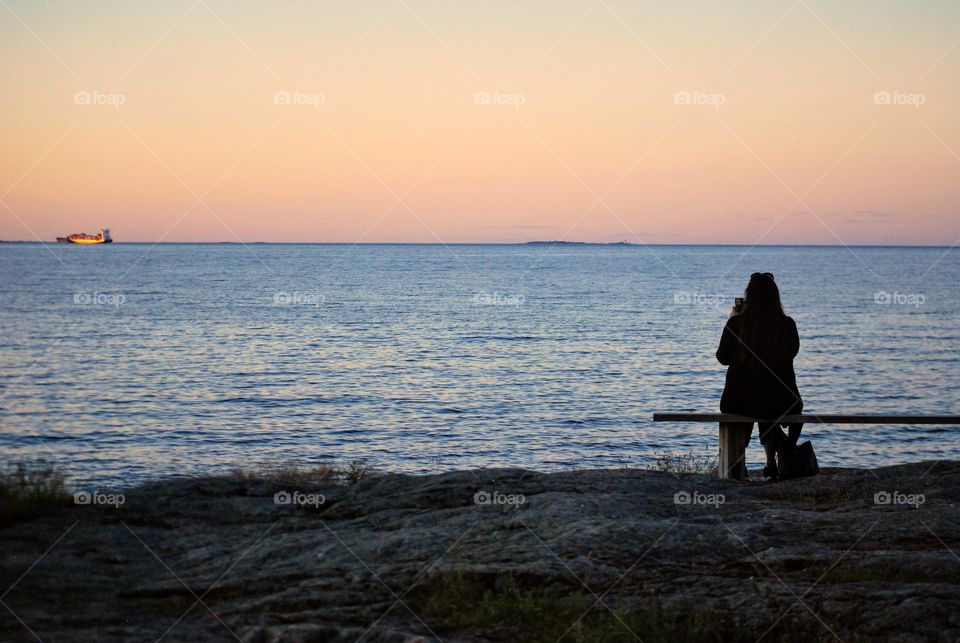 Woman wathing the sunset