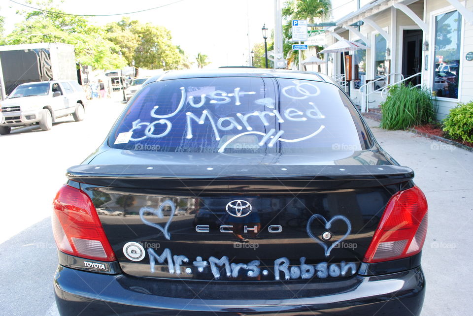 A car of people who just got married in Key West, Florida