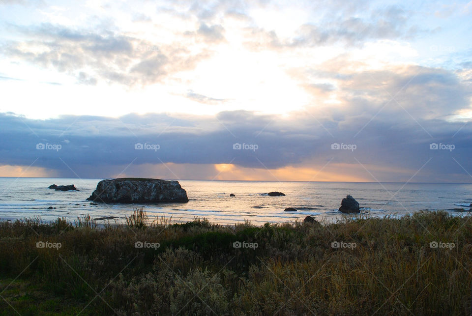 Broad Oregon coast at sunset