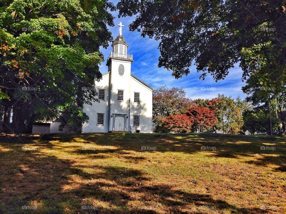 Autumnal walk . Church on top of the hill