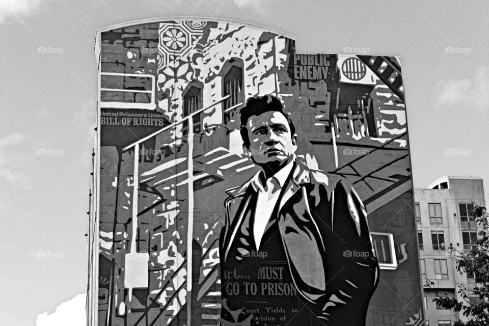 black and white graffiti art architecture of a legendary singer. architecture, black and white, singer performer.