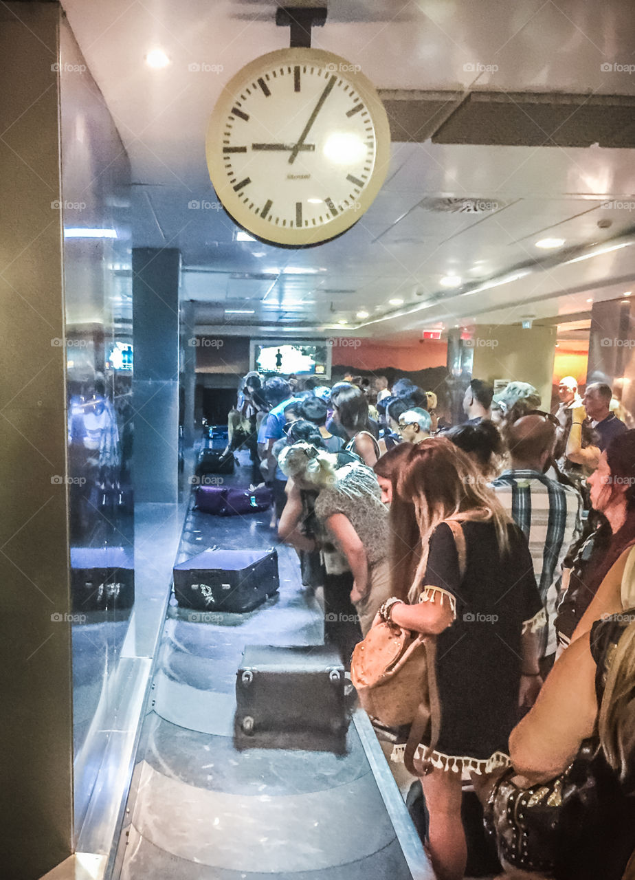 Passengers Waiting Baggage At The AirPort