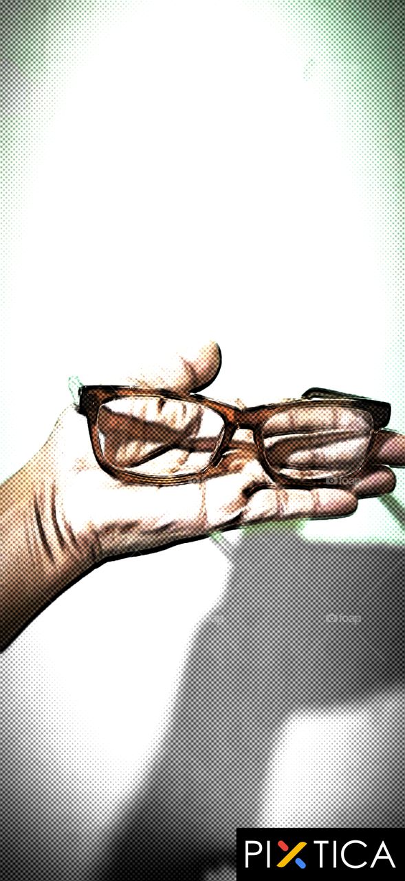 spectacle is on my hand