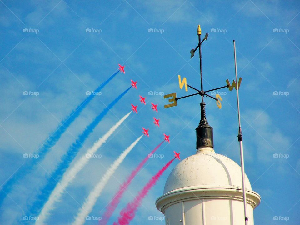 Lighthouse with Red Arrows