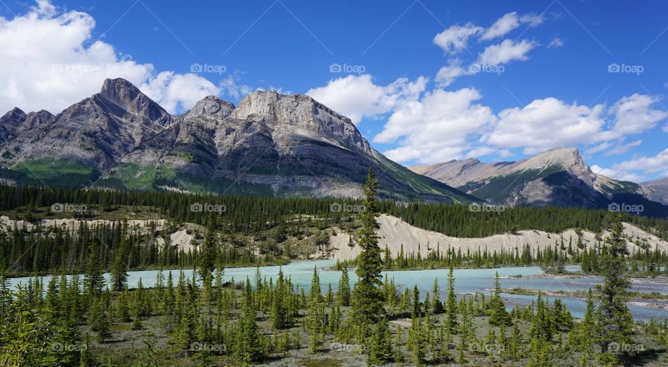 Pulled over to take a photograph of the beautiful clear glacial water trickling down stream ... so beautiful.