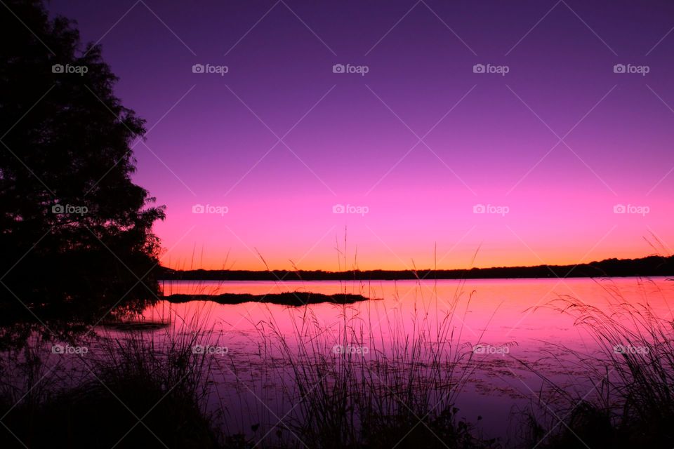 Pink sunset. This is a photograph of a pink sunset over Lake Fork.