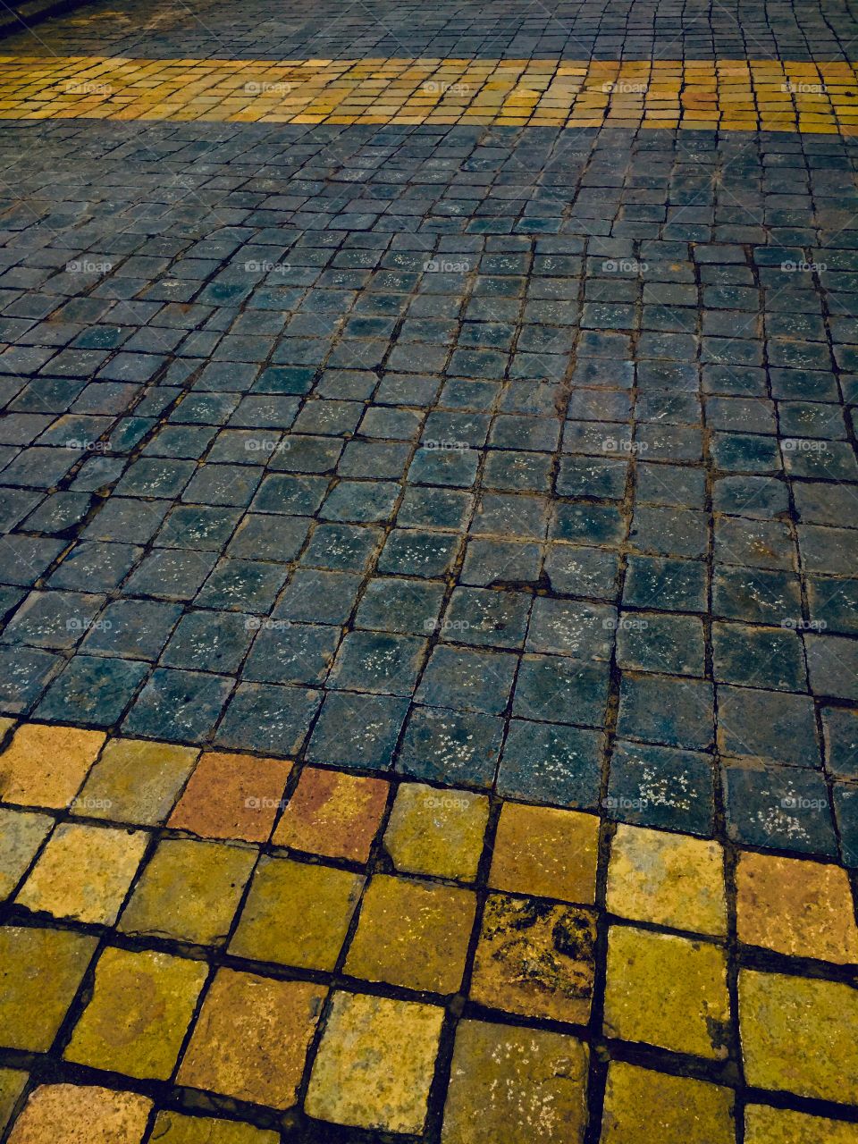 Outside floor tiles at the gate of the school 