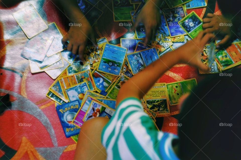 Playing Pokemon cards games 