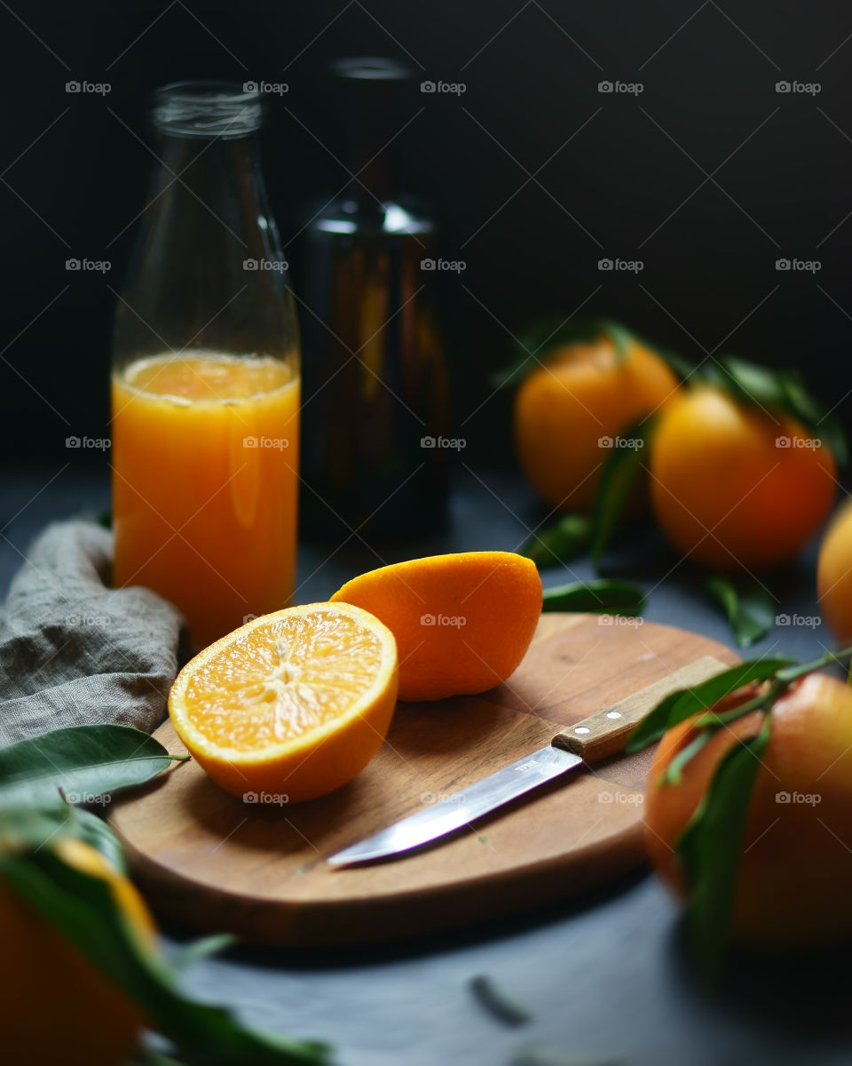 preparing fresh orange juice