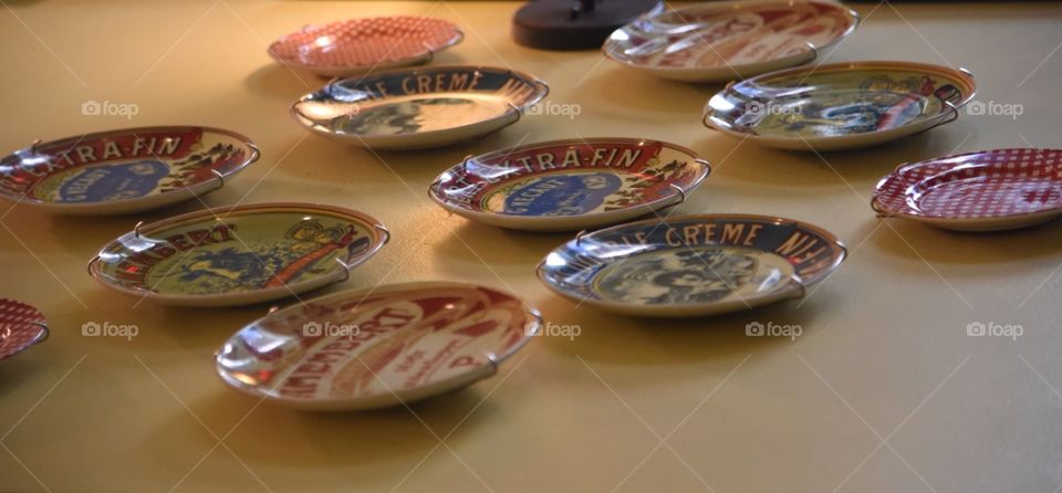 perspective shot of plates on a wall