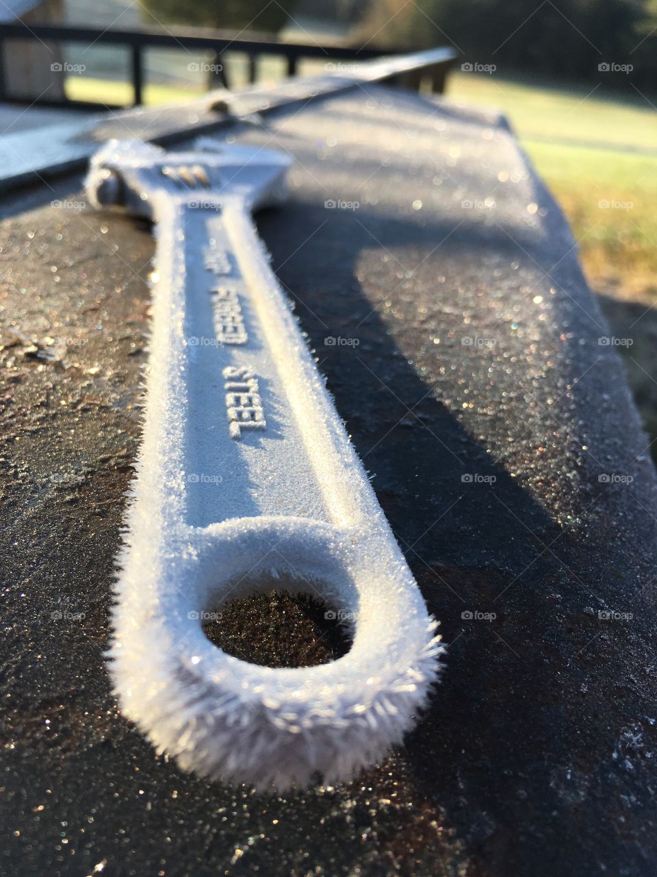 Frost on a forgotten tool.