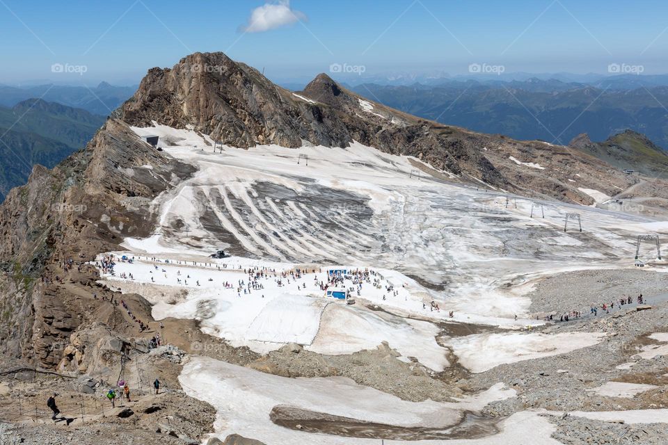 Panoramic view of snow activities and hiking trail on the glacier of Kitzsteinhorn Austria in summer 