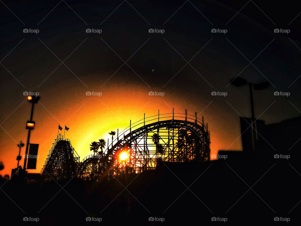 Girders of a rollercoaster at sunset