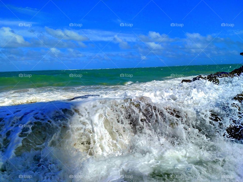 Scenic view of foamy ocean