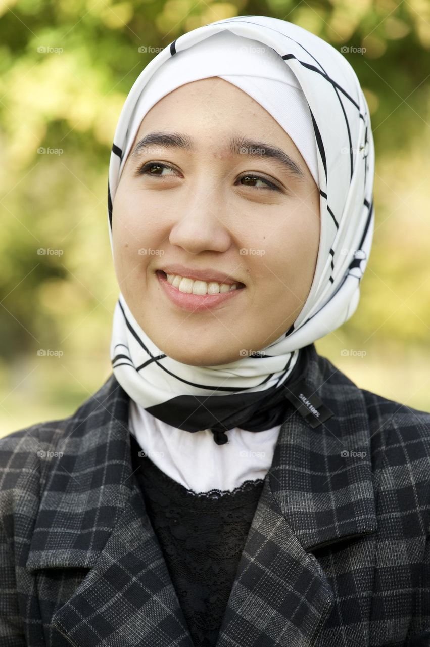 Smiling face portrait of beautiful girl 