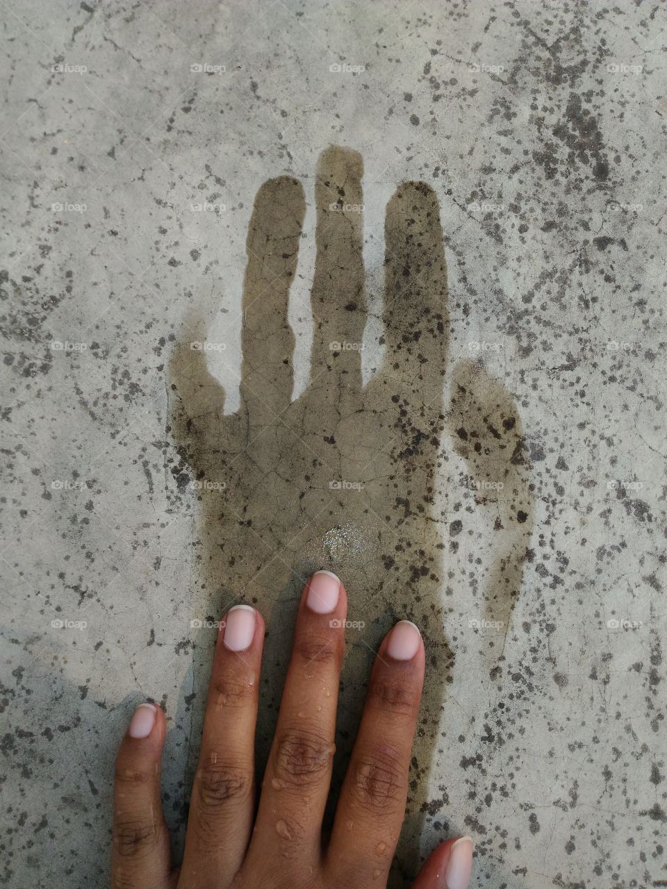 Leaving hand trails on cement