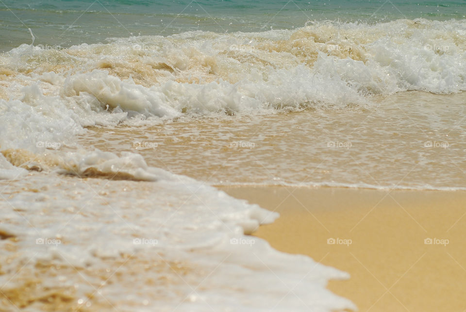 Coast, beach waves, foam , sand   Turquoise