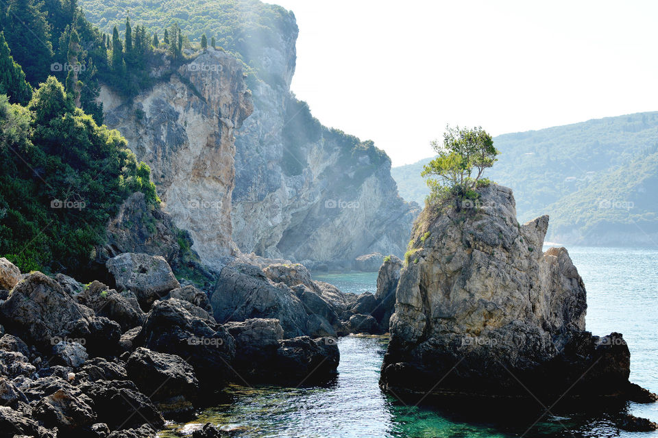Scenic view of sea and rocks in Corfu