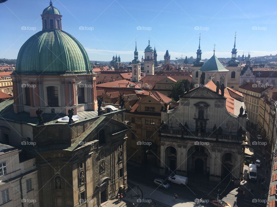 View of Prague. Blue sky and historical buildings. Prague skyline. Saint Charles Bridge 