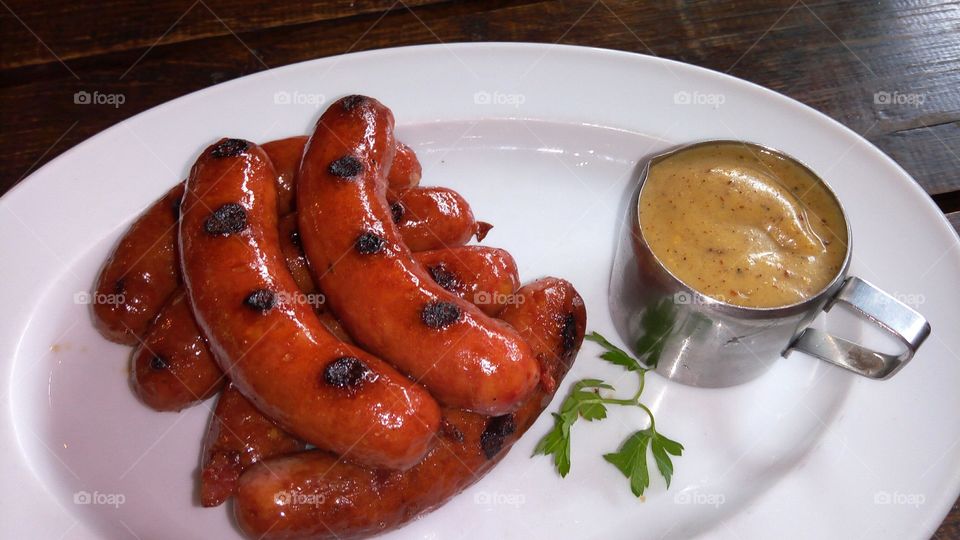 Roasted sausages with mustard, home made