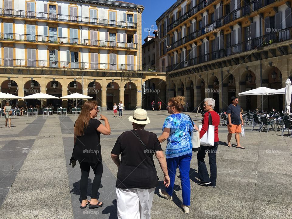 Walking through the old town square of San Sebastián 