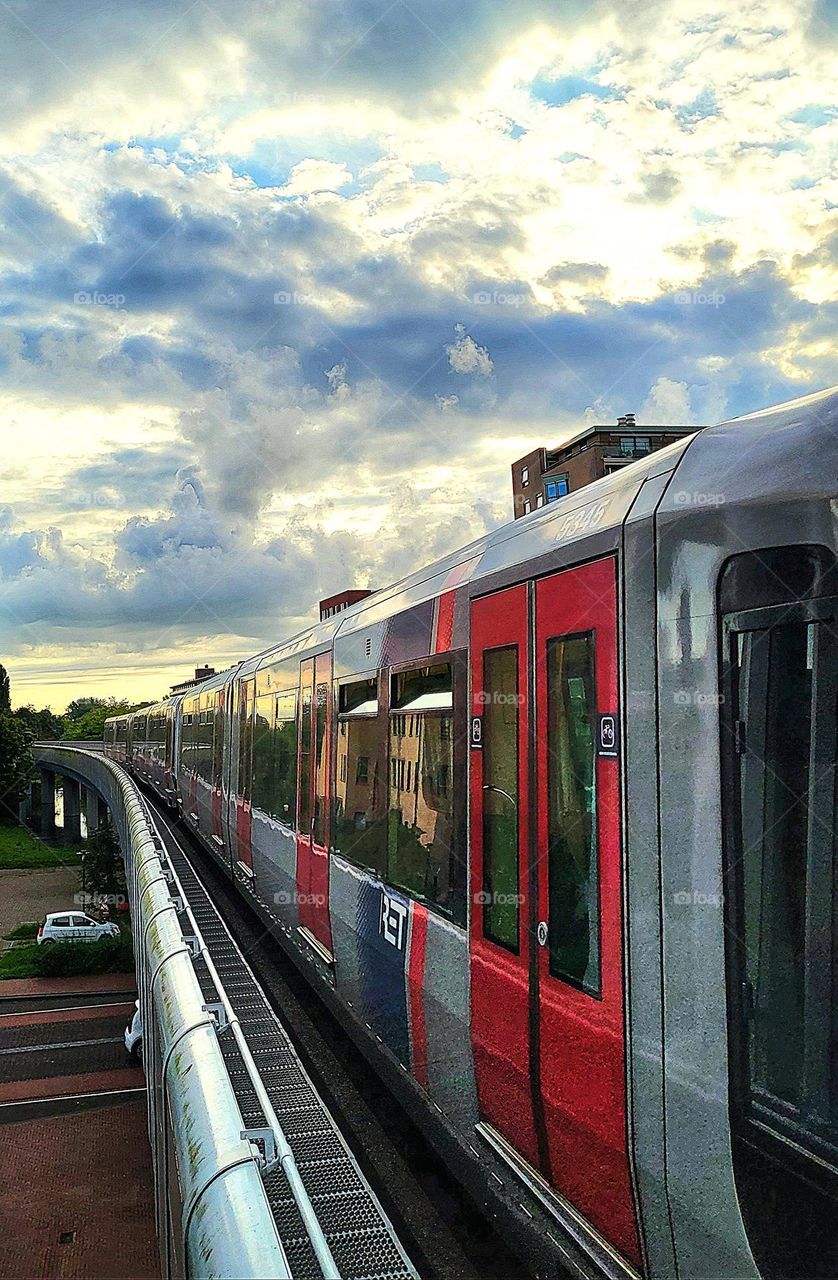 A beautiful way to look at the sunrise in the morning when you to work is to take the metro.