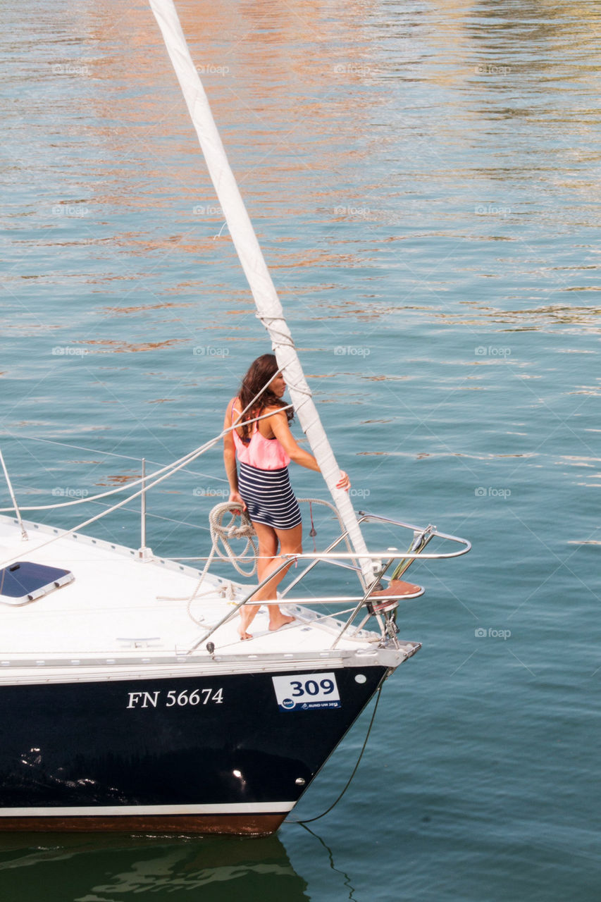 Woman on a sailboat 