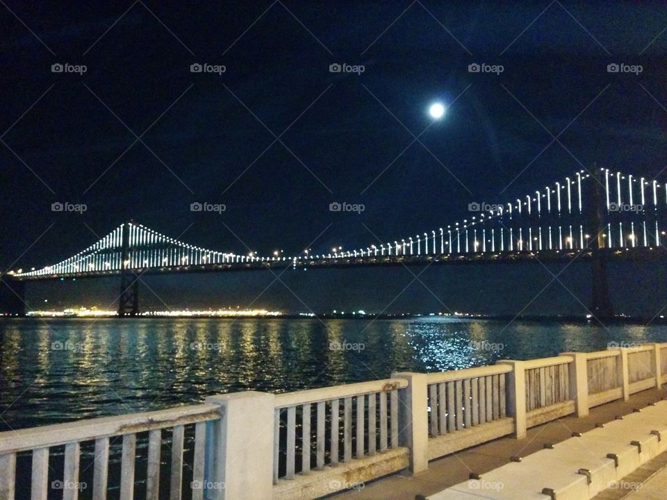 bay bridge with full moon