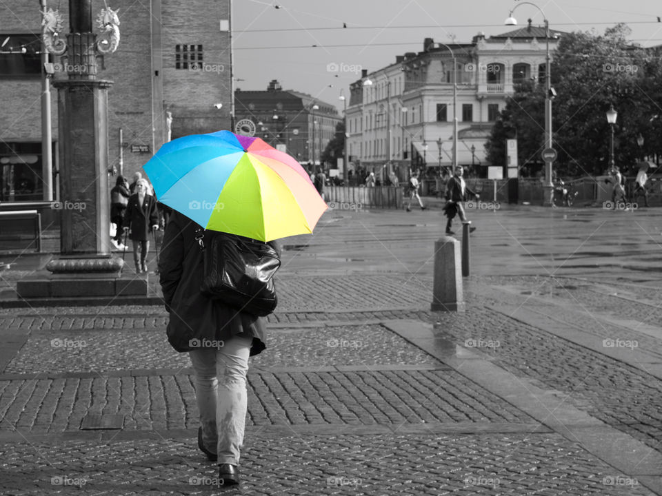 Man with the colourful umbrella!