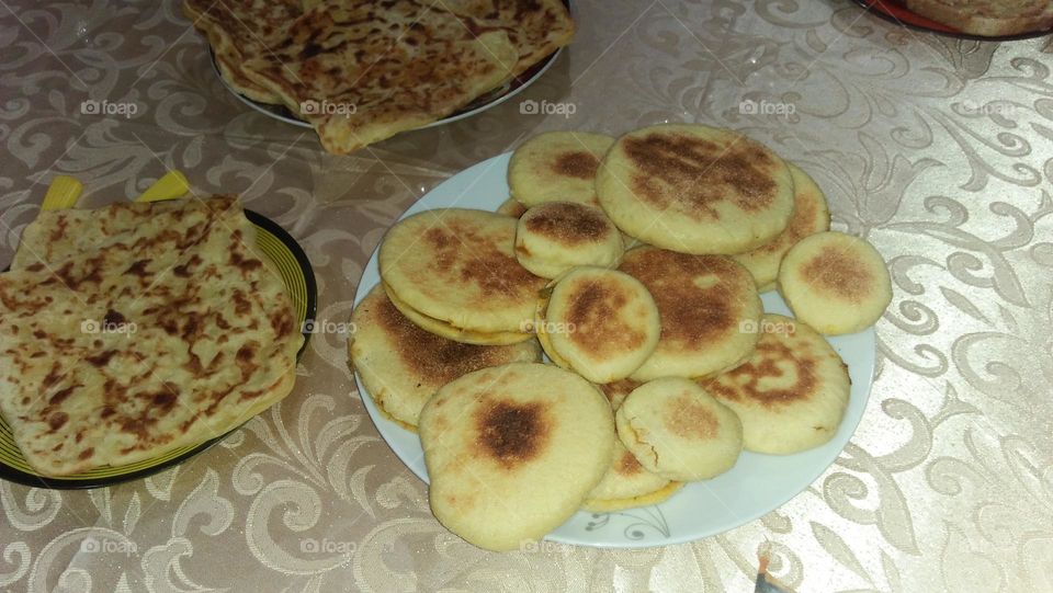 Various bread on table.