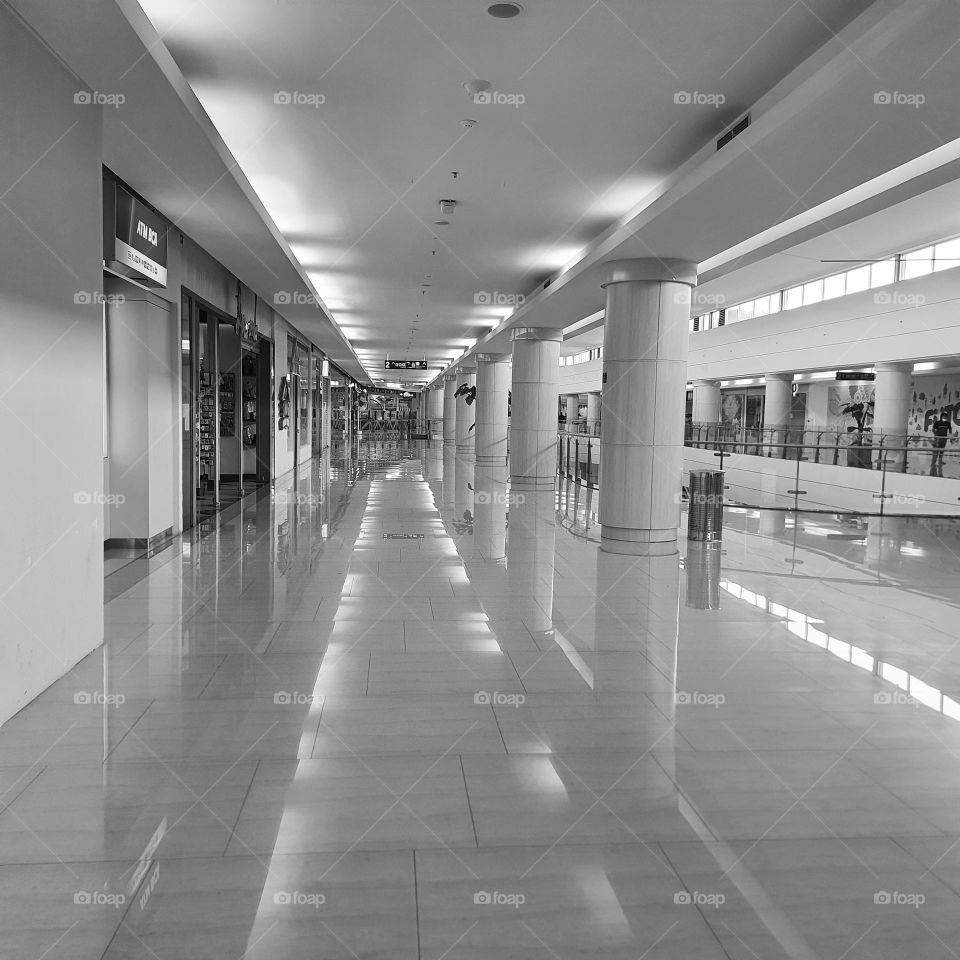 structure and shadow inside mall - architecture B & W