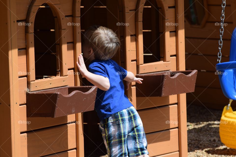 U anybody home?. Toddler at new playground 