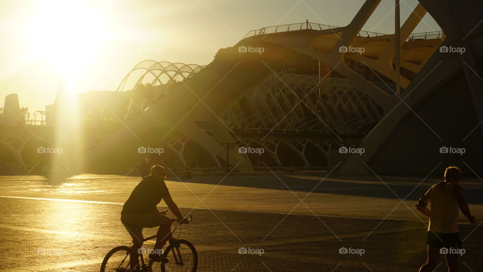 Sunset#humans#sport#buildings#construction#art#bike#run