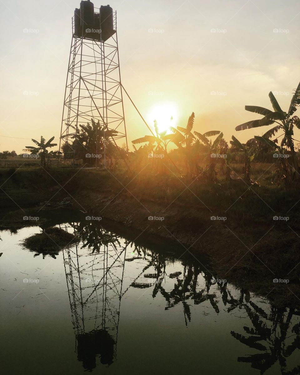 reflection of sunset on water