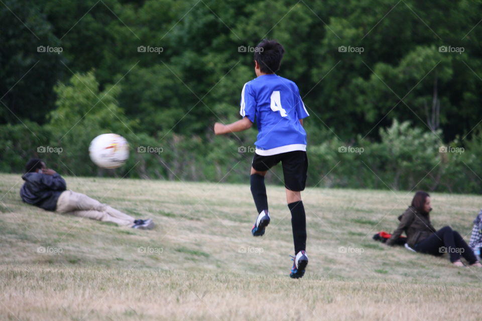 Playing soccer